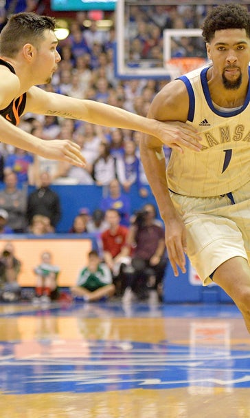 Lawson's 25-point surge leads Jayhawks over Cowboys, 84-72